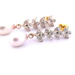 Zonder minimumprijs - Oorbellen - 9 kt. Roségoud - 0.50ct.