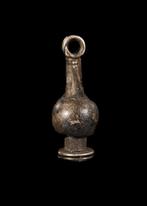 Oude Egypte, Nieuwe rijk Zilver Poppy Amulet (Zonder