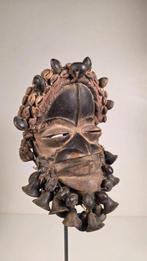 Masque en bois et clochette en bronze Dan Guré - Côte