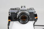 Olympus OM-1 + Zuiko 1,8/50mm + batterij adapter + leren, Nieuw
