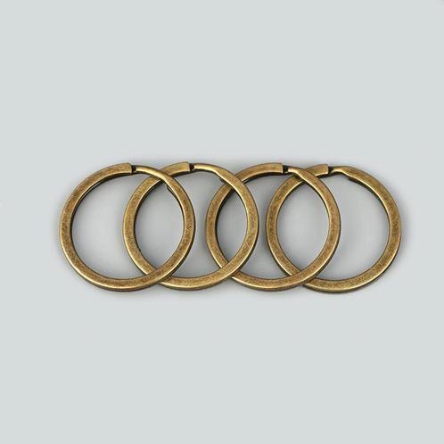 Set van 30 mooie sleutelringen (22-28 mm, kleur 1: brons), Doe-het-zelf en Bouw, Gereedschap | Overige machines, Nieuw, Verzenden