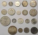 Wereld. Lot diverse zilveren munten. 1849/1970 (19 stuks)