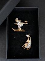 Beeld, Broches skiër en zeilboot ingelegd met Swarovski