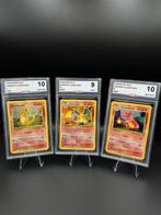 Pokémon - 3 Graded card - CHARMELEON HOLO & CHARMANDER HOLO, Hobby en Vrije tijd, Verzamelkaartspellen | Pokémon, Nieuw