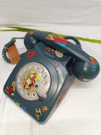 Téléphone analogique - À roulettes - Plastique - Métal.