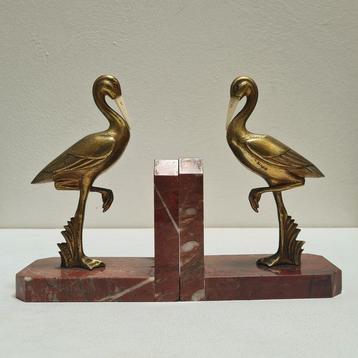 GUAL - Boekensteunen - Ibis Chriséléphantines - Brons,
