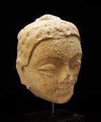 Gandhara Hoofd van Boeddha op voet - 3e/4e eeuw na Christus
