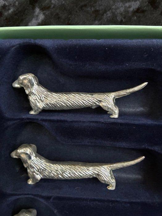 Messensteun (12) - Metaal - 12 teckel messenleggers, Antiek en Kunst, Antiek | Meubels | Tafels