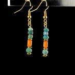 Het oude Egypte, Grieks-Romeinse periode Oorbellen met glas-
