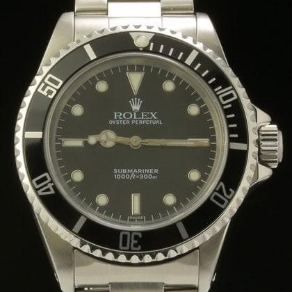 Rolex Submariner 14060 uit 1999, Bijoux, Sacs & Beauté, Montres | Hommes, Envoi