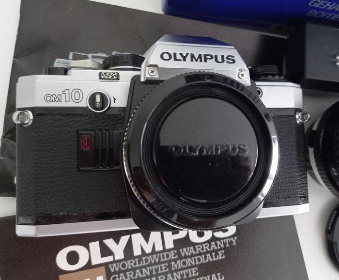 Olympus OM-10 + F. Zuiko 50mm 1.8 + RMC Tokina II 28mm 2.8 +, Audio, Tv en Foto, Fotocamera's Analoog