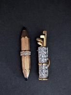 Statue, Broches golftas en potlood ingelegd met Swarovski