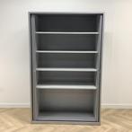 Tweedehands Mibra roldeurkast (hxbxd) 195x125x50 cm , grijs, Huis en Inrichting, Kasten | Roldeurkasten en Archiefkasten, Gebruikt