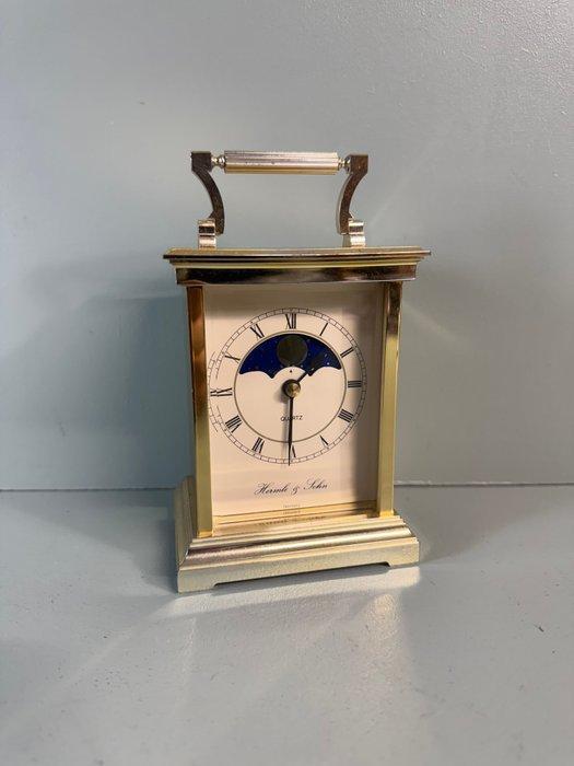 Klok - Geïnspireerd door de antieke stijl Metaal - 1980-1990, Antiek en Kunst, Curiosa en Brocante
