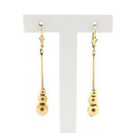 8 Krt. Lange oorbellen met beweegbare bollen (vintage), Handtassen en Accessoires, Antieke sieraden, Ophalen of Verzenden, Goud