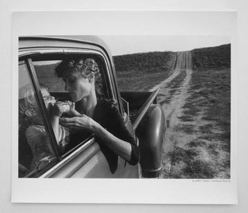 Larry Towell - My oldest son Moses Towell eats a wild pear.