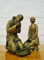 Twee bronzen Art Deco beelden/boekensteunen - sculptuur,