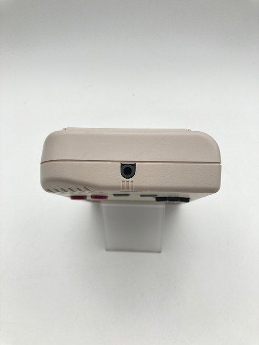 nitnedo - Nintendo Game Boy DMG-01 1989 Console + Animal, Games en Spelcomputers, Spelcomputers | Overige Accessoires