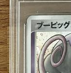 Pokémon - 1 Graded card - Grumpig #030 Holo, Première, Hobby en Vrije tijd, Nieuw