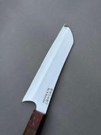 Keukenmes - Oost ontmoet West: K Romain Bunka erfgoed - K