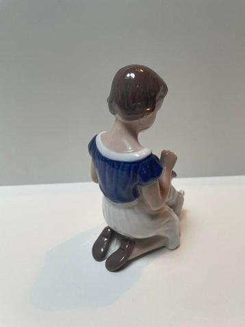 Bing & Grondahl - Figure - A girl playing with a dog (2316)