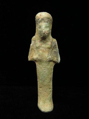 Égypte ancienne Faience ushabti décoré tenant une houe et un