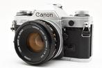 Canon AE-1 + FD 1.8/50mm S.C. Single lens reflex camera, Audio, Tv en Foto, Nieuw