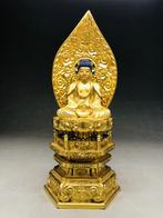 The seated statue of Shaka-nyorai Buddha  - Beeld