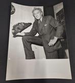 Interpress - Jean Cocteau showing his bicorn (hat) -