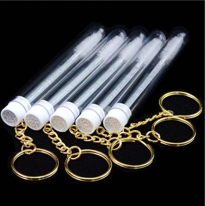 Wimperborstel Sleutelhangers Wit, Kleding | Dames, Carnavalskleding en Feestkleding, Nieuw, Verzenden