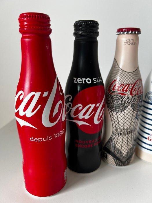 Themacollectie - Exclusieve set – 7 flessen Coca-Cola, Antiek en Kunst, Antiek | Speelgoed