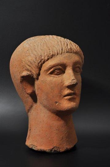 Etruscan Terre cuite Tête votive dun garçon. Anciennement