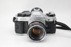 Canon AE-1 Program + FD 1,8/50mm Single lens reflex camera, Audio, Tv en Foto, Nieuw