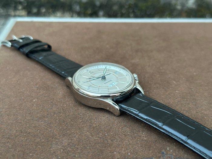 Baume & Mercier - Classima Alarm/GMT - M0A08700 - Heren -, Handtassen en Accessoires, Horloges | Heren