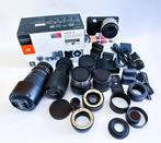 Sony  NEX-5 with many (18) accessories - lens cases,