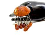 Broche ancienne unique avec de gros pierres dambre naturel