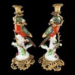 Louis XV style pair of ormolu porcelain figural parrot