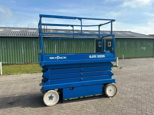 Veiling: Schaarlift Skyjack SJ III - 3226 Elektrisch 9.92m, Zakelijke goederen, Machines en Bouw | Liften, Steigers en Ladders