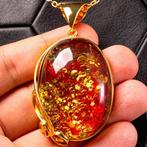 Pendentif Cognac Red Amber : pierre précieuse avec