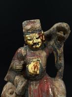 Dignitaire assis sur chien de Fo - 18th c. - Hout - China -