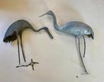 Two elegant bronze cranes (tsuru) with loose feet -