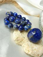 Bras et marionnette en minéraux en lapis-lazuli de qualité