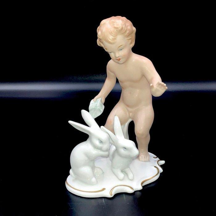 Kurt Steiner - Wallendorf, Thuringia - Putti Feeding Rabbits, Antiquités & Art, Antiquités | Verre & Cristal