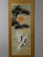 Prachtige vliegende kraanvogels, opkomende zon en