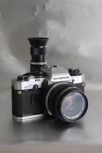 Olympus OM 10 met hoekzoeker Analoge camera, Audio, Tv en Foto, Fotocamera's Analoog, Nieuw