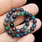 Multicolore zwarte opaal van Ethiopische oorsprong., Verzamelen