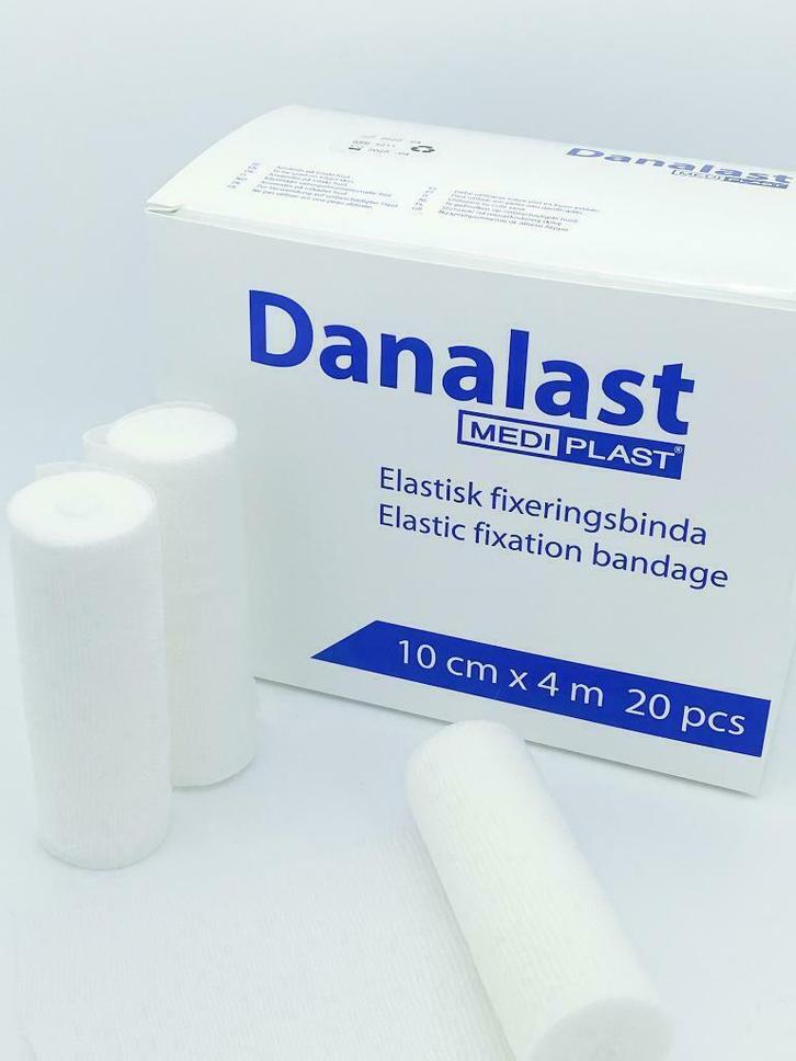 Danalast elastisch fixatiewindsel 10 cm x 4m - Doos 20 stuks, Diversen, Verpleegmiddelen, Nieuw, Ophalen of Verzenden