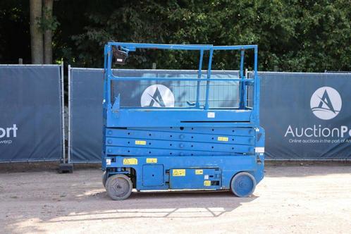 Veiling: Schaarlift Genie GS-2632 Elektrisch 9.96m 2007, Zakelijke goederen, Machines en Bouw | Liften, Steigers en Ladders, Ophalen