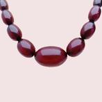 Collier Collier de perles marbrées en ambre cerise, bakélite, Nieuw