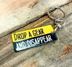 Drop a gear sleutelhanger, Verzamelen, Merken en Reclamevoorwerpen, Verzenden, Nieuw